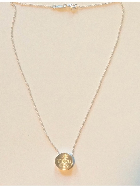 Tiffany & Co. Jewelry - Tiffany & Co. Silver Round Logo Pendant Necklace